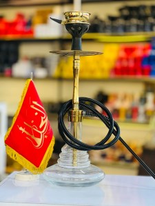 ست قلیان اسکای بدنه استیل طلایی براق شیشه شفاف دارای شلنگ و سری سیلیکونی ست قلیان اسکای بدنه استیل طلایی براق شیشه شفاف کد SK106