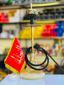 ست قلیان اسکای بدنه استیل طلایی براق شیشه سنگی دارای شلنگ و سری سیلیکونی ست قلیان اسکای بدنه استیل طلایی براق شیشه سنگی کد SK108