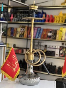 ست قلیان کرنو بدنه طلایی مات شیشه دودی دارای شلنگ و سری سیلیکونی ست قلیان کرنو بدنه طلایی مات شیشه دودی کد KE101